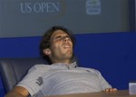 Rafael Nadal Cramps Up During Press