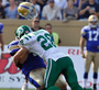 CFL QB's Helmet Pops Off After Hit