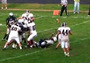 High School QB Throws TD Practically on His Back
