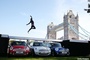 Long Jumper Leaps Over 3 Mini Coopers