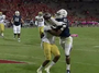 Arizona's Criner Grabs TD Around Helmet of Opponent