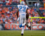 Lions' Houston Picks Off Tebow and Goes 100 Yards