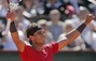 Nadal Returns Ball While Sitting Down