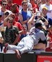 Carlos Santana Tackles Fan in the Stands