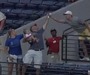 Fan Makes One-Handed Grab While Holding Baby
