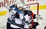 Marleau Leads Sharks Past Flames in Calgary