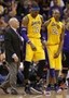 Howard Reinjures Shoulder in Loss