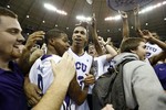 TCU Rushes Court after Upset of No.