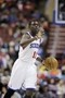Holiday Leads Sixers to 101-100 Win