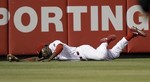 Phillies' Brown Lays Out for Catch