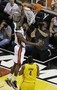 LeBron's Triple-Double, Buzzer-Beater Lift the Heat