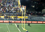 Fan Climbs Goalpost During CFL Game